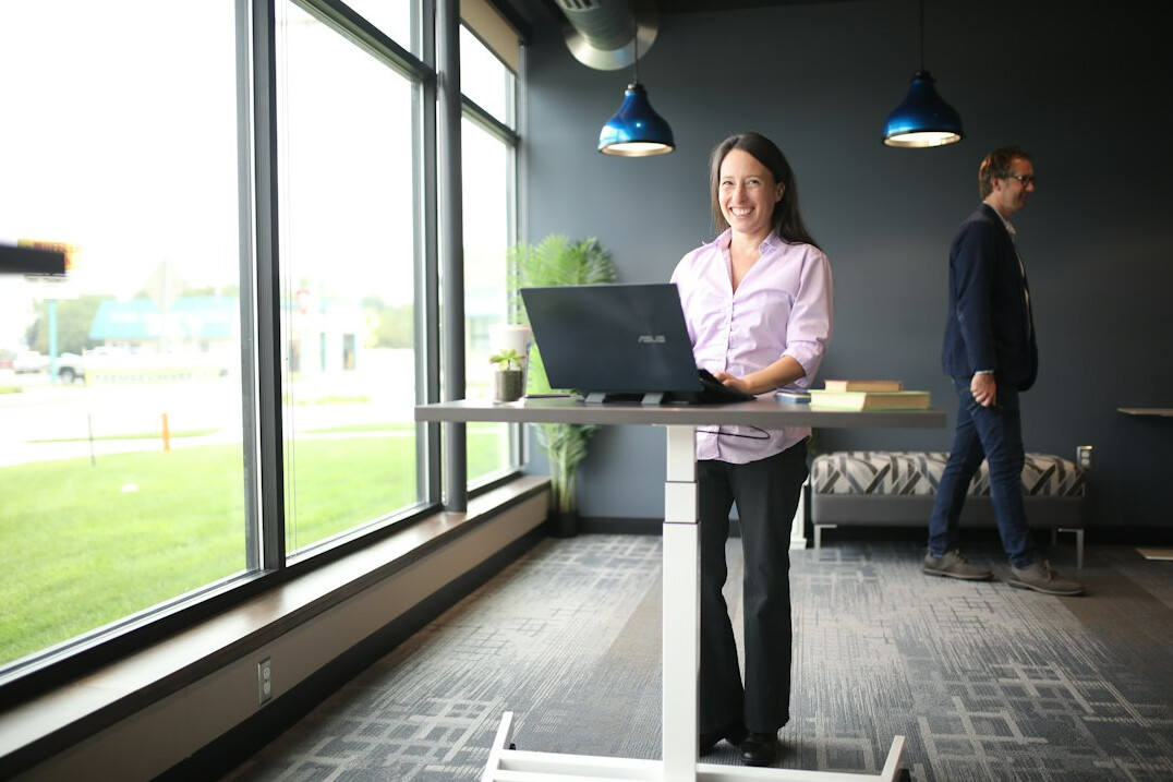 productive employee at standing desk
